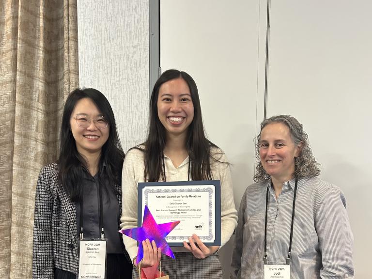 Award recipient Celia T. Lee at the 2025 NCFR conference, with her advisor Dr. Xiaoran Sun on her left and advisor Dr. Jodi Dworkin on her right.