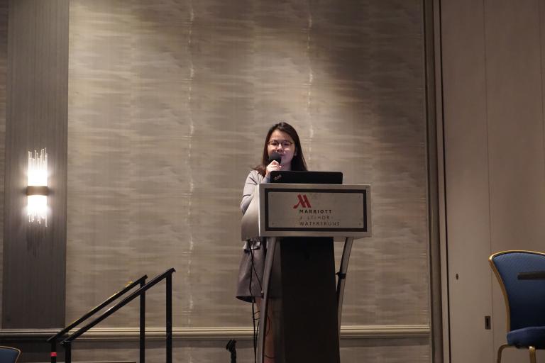 Ting Xu presenting her research in a paper session at the 2025 NCFR conference.
