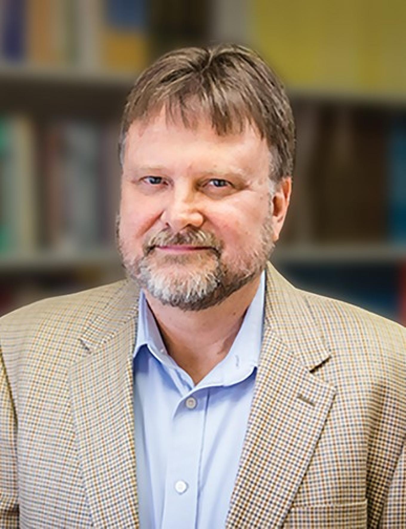 Headshot of Dr. Jeffry A. Simpson.